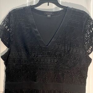 Black overlaid crocheted “lace”. lined black. Side zip. Sz. 14, fits like 10/12.
